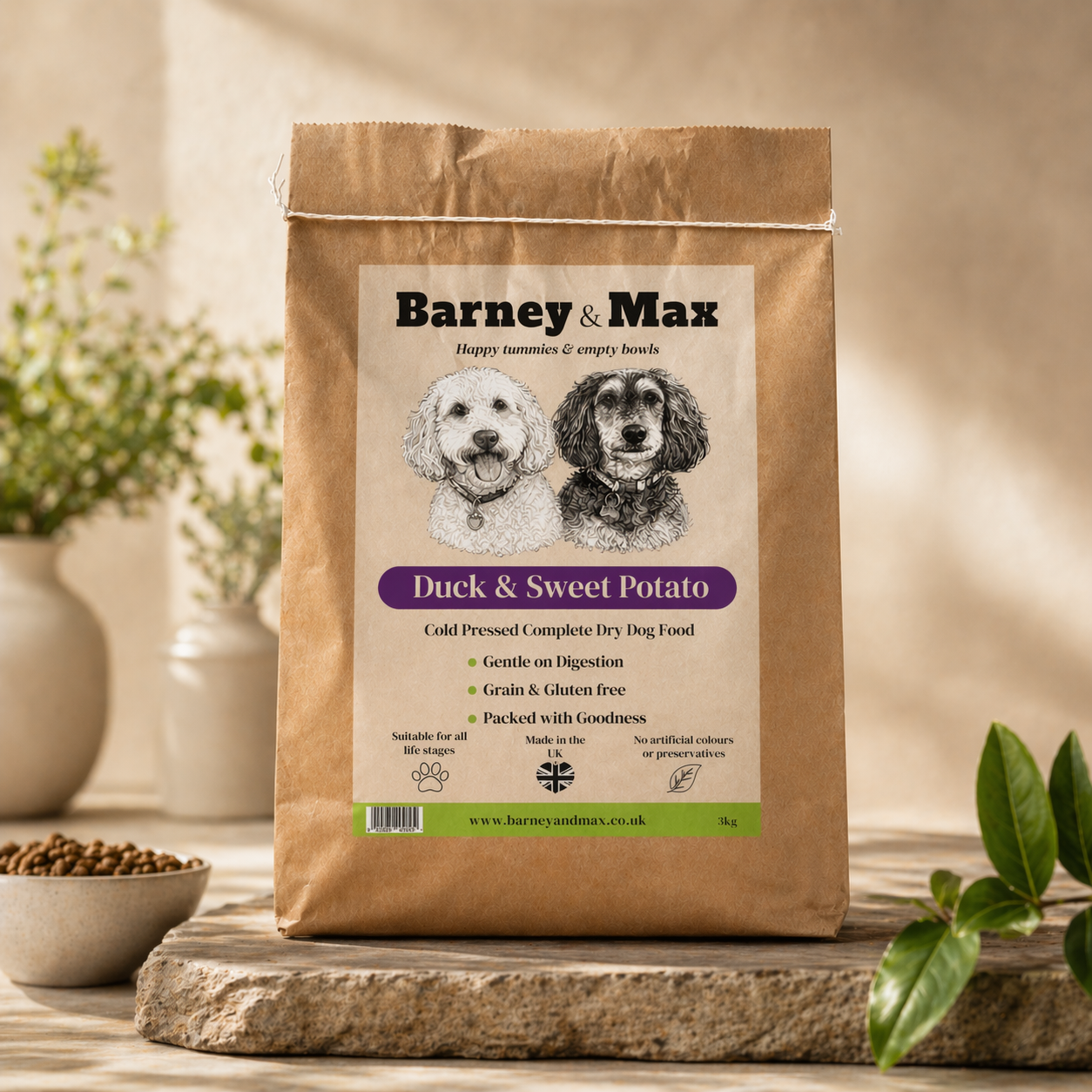 Bag of Barney & Max duck and sweet potato dog food on a wooden surface with plants in the background